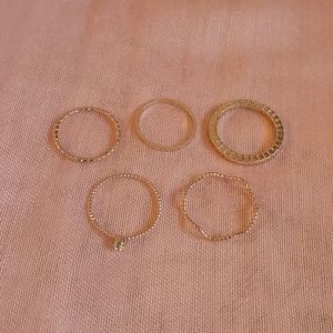 Gold curved ring set